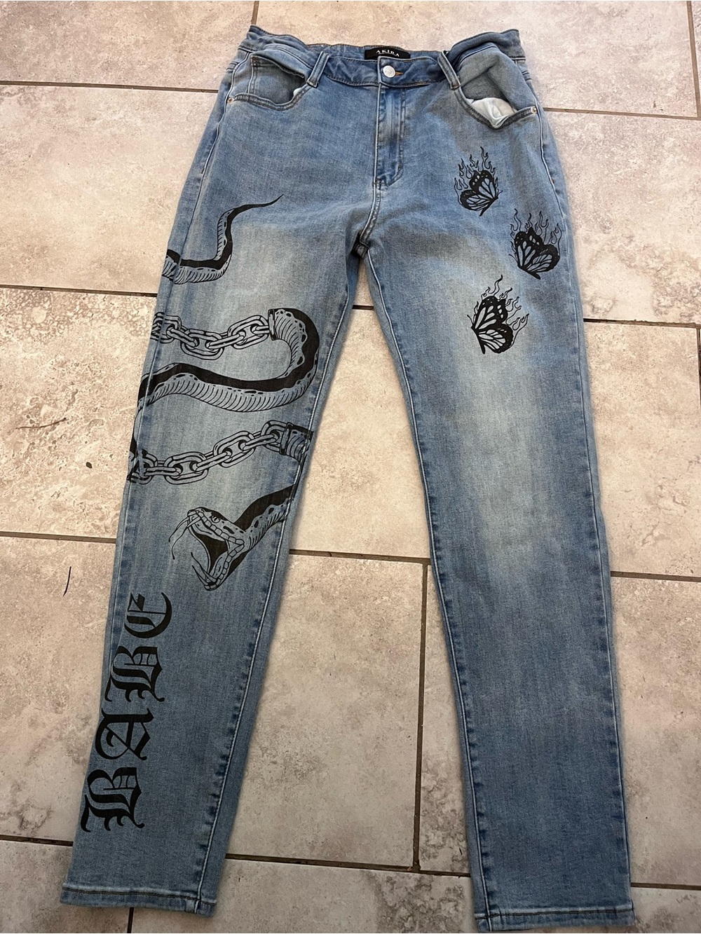 AKIRA Light Blue Skinny Jeans with Black Snake & Butterfly Graphics